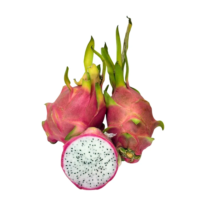 Fresh red dragon fruit with cut fruit showing white flesh