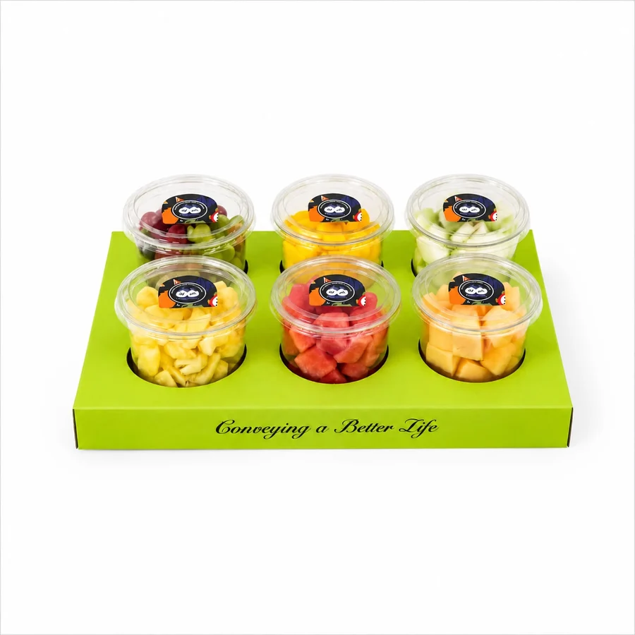 Six cups of assorted fresh fruit arranged as a sharing platter